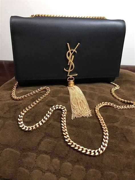 ysl black clutch bag with tassel